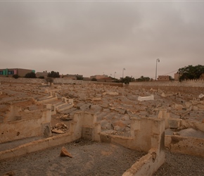 In the centre of iznit behind a high wall are graves. The door opens on a Friday. Of interest is that Moroccans are buried on their right sides