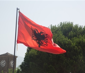 An Albanian flag flutters at Gjirokaster Castle