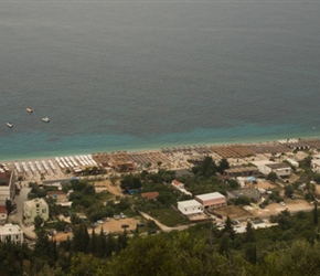 Coastal view of the resorts below, a lot of umbrellas