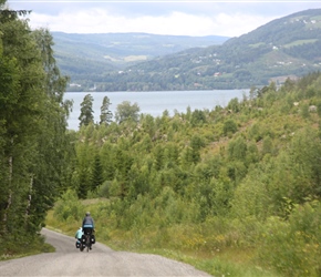 Simon and Laurinda descend a gravel track