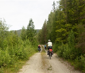 Simon, Laurinda and Ian follows the gravel track