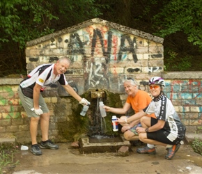 Marcus, Michelle and Neil fill water bottles